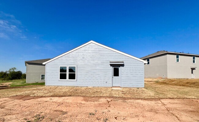 Building Photo - New 4 bedroom, 2 bath in Treaty Oaks Community