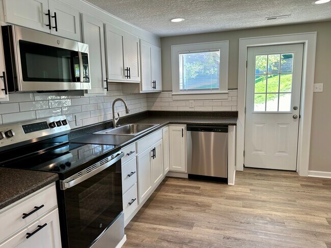 Multitude of soft close cabinets/drawers - 2304 Belle Ave NE