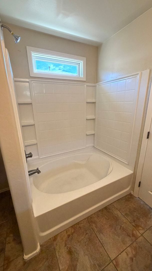 Building Photo - Spacious Surprise home with large backyard