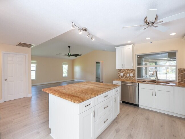 Building Photo - 3 BEDROOM • 2 BATHROOM • PRIVATE POOL • WATERFRONT • BOAT LIFT • ZERO DEPOSIT MOVE-IN AVAILABLE