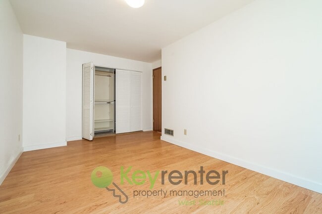 Building Photo - **Rent Special** Remodeled Two-Bedroom with Open Floor Plan, Parking, and Easy Transit Access