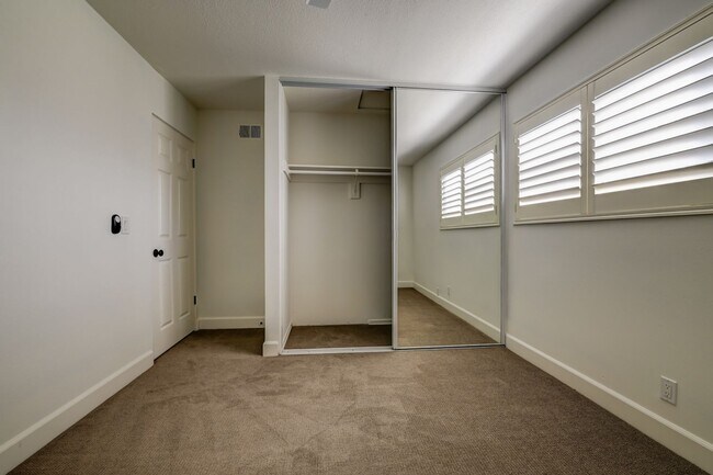 Building Photo - Updated, 3 bedroom 2.5 bath townhouse located in the Newport Riviera Community