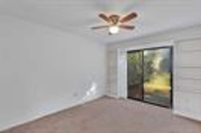 Building Photo - Comfortable & Spacious 3BR Condo with Built-In Closets and Backyard Patio in Tavares Community