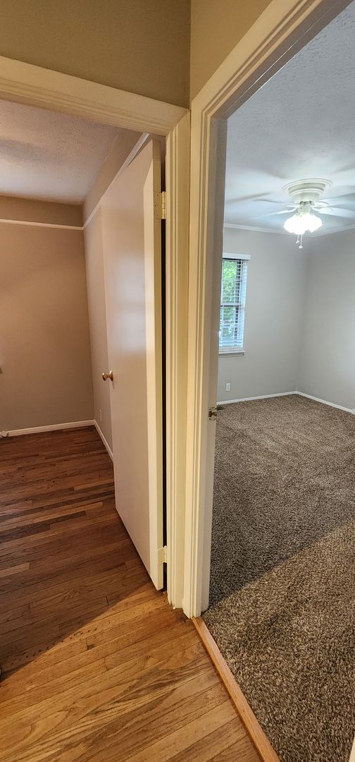 Building Photo - Check This One OUT!! To View is to Rent! 3 Bedroom, 1 Bath. Hardwood Floors, Tile and Newer Carpe...