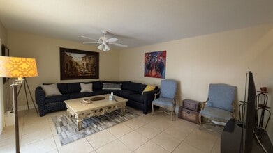 Building Photo - Spacious Wellington End-Unit Townhome | 2 Primary Suites | Screened Patio
