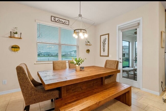 Building Photo - Water Front Home- 4 Large Bedrooms-3 baths Gated Community Call Sheila Campbell 407-687-7900