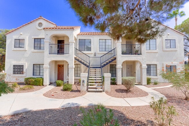 Building Photo - Stylish Upstairs Condo with Dual Primary S...