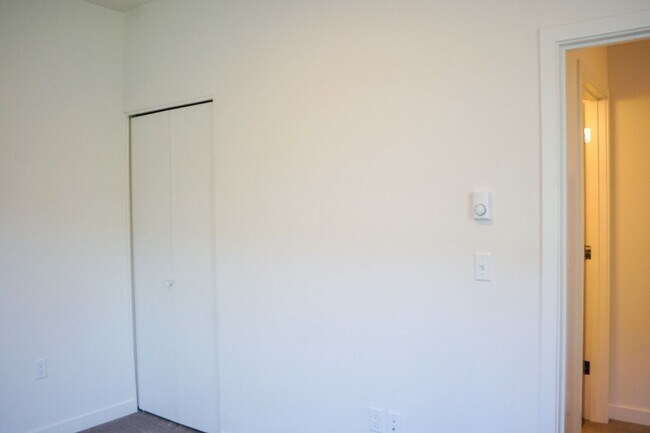 Building Photo - Modern & Sleek One-Bedroom Townhouse Ready...