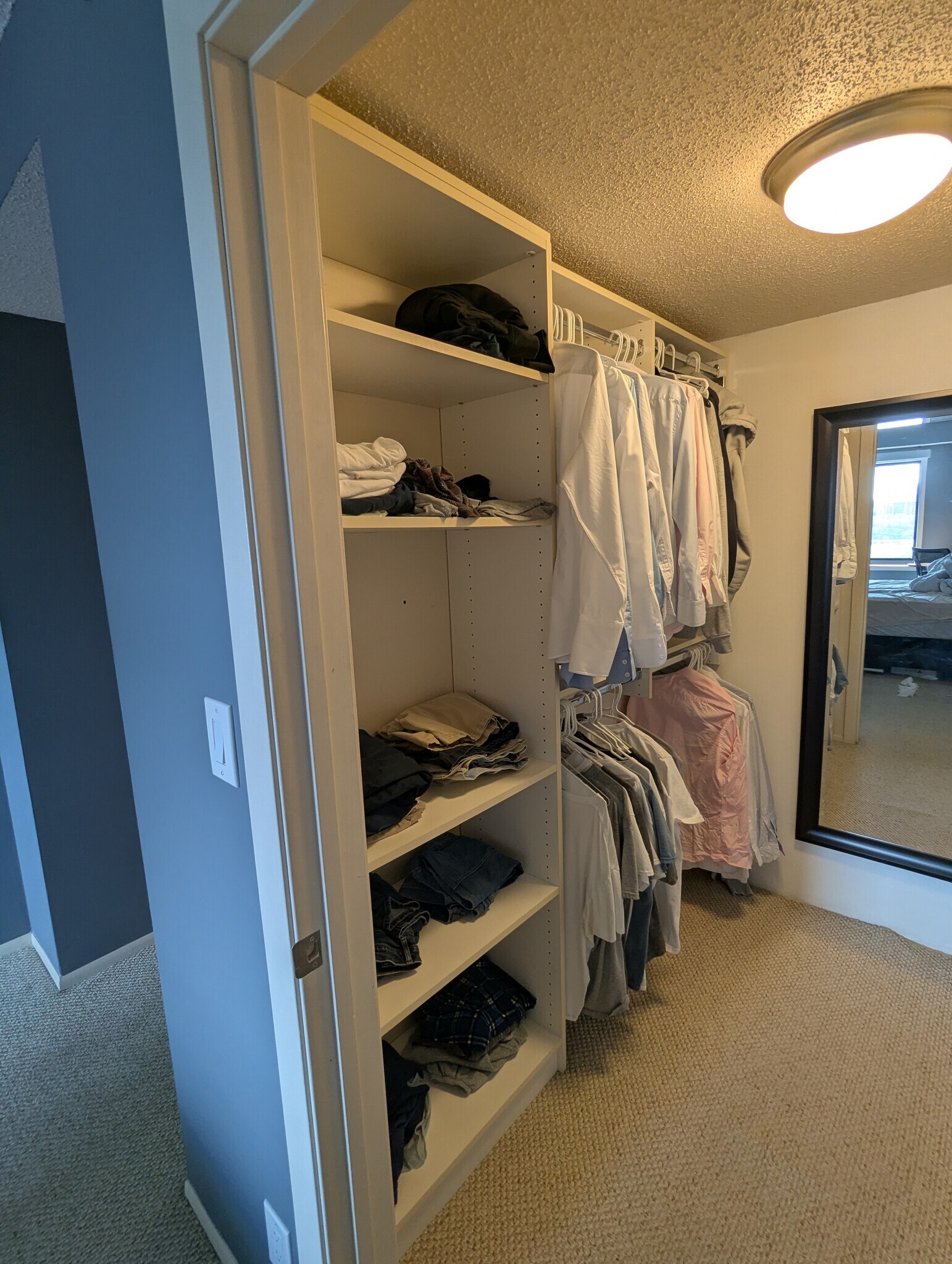 Walk-in closet left side. - 110 1st Ave NE