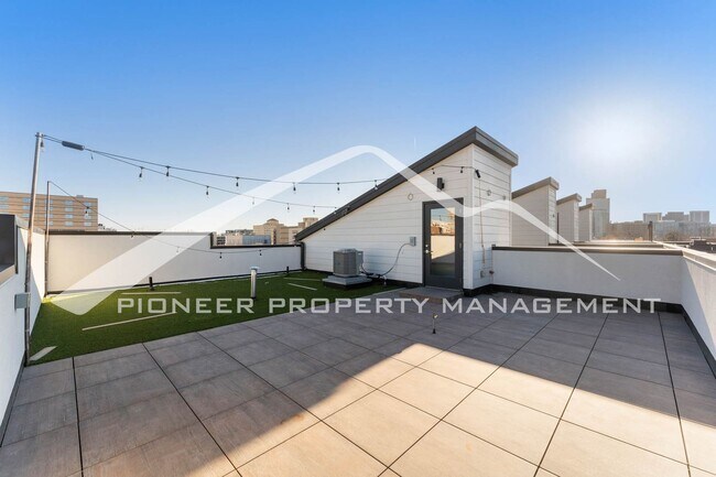 Building Photo - Fantastic Townhome with A Roof Top Patio, Attached Garage, and Central AC!