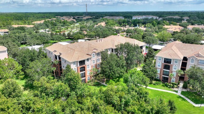 Building Photo - First floor condo in Champions Gate! Ready...