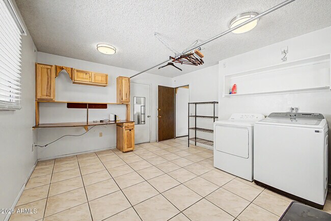 Building Photo - 9847 W Wrangler Dr