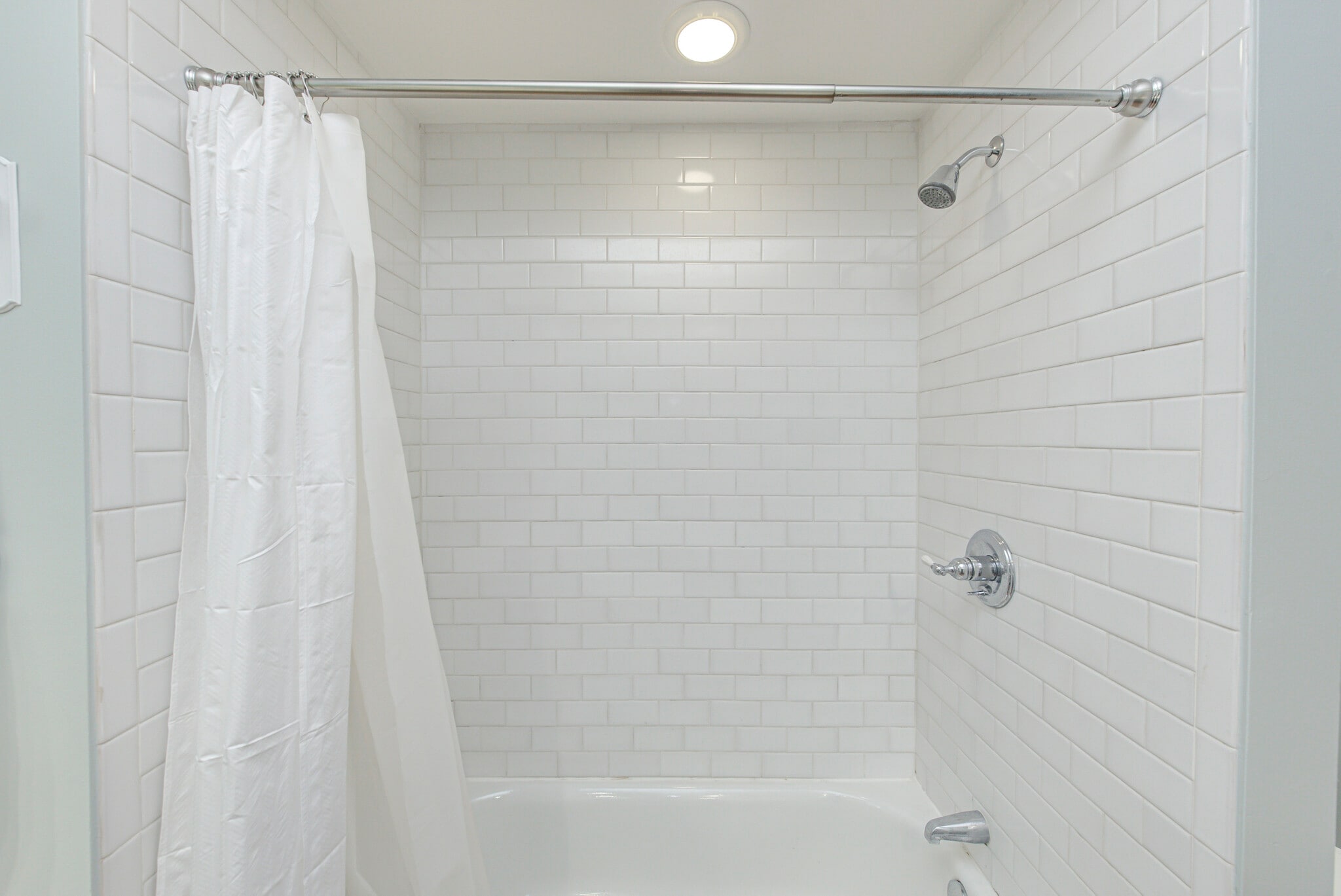 Shower/tub combo with ceramic tiles - 237 E Saint Joseph St