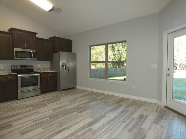 Building Photo - 4985 Creekside Ln