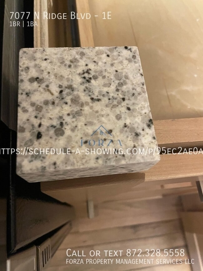 Building Photo - 7077 N Ridge Blvd