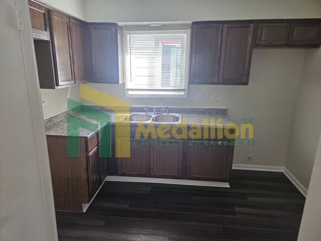 Building Photo - Updated 4-Bedroom Home with Finished Basement and Fenced Yard