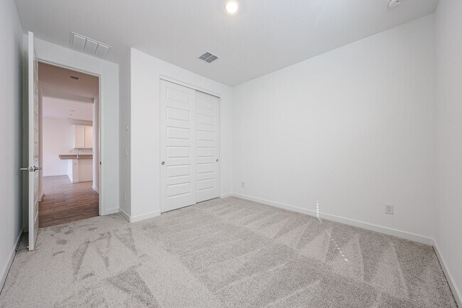 Building Photo - COMING SOON!! Recently built 5-Bedroom Home in Goodyear with Upgrades & Resort-Style Amenities
