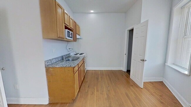 Building Photo - 1234-40 Rising Sun Ave