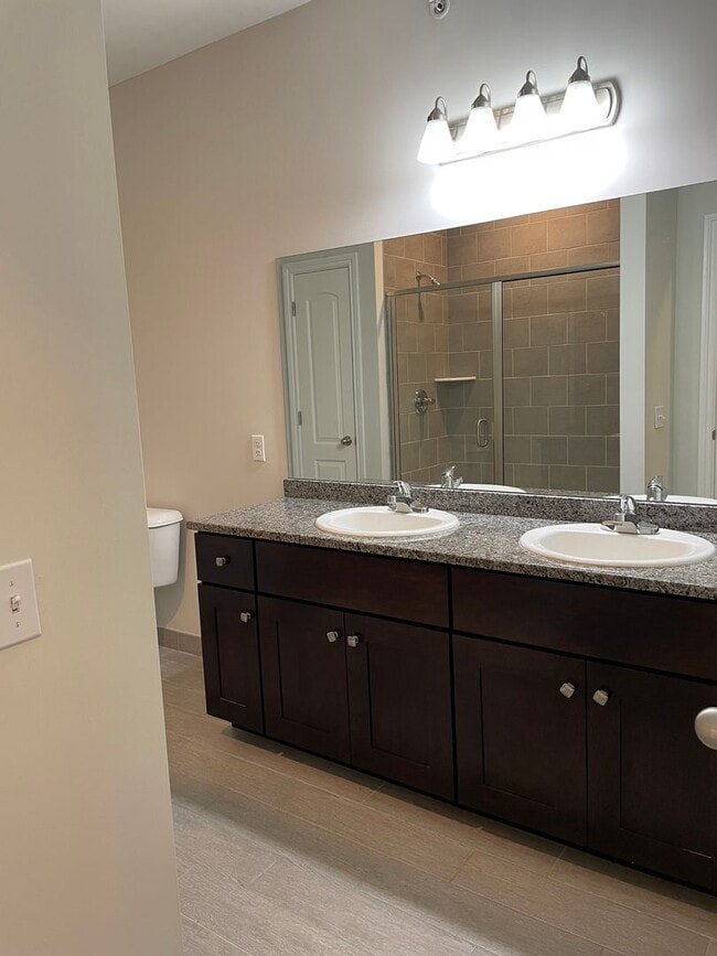 Building Photo - Shelby Township, 2-Bedroom, 2- Baths, Private Balcony with att. Garage