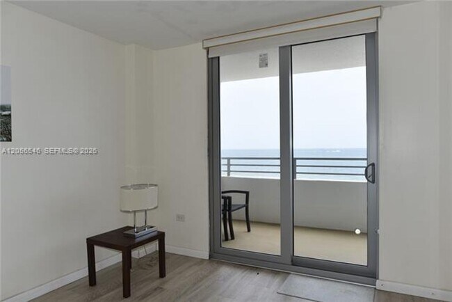 Building Photo - 5555 Collins Ave