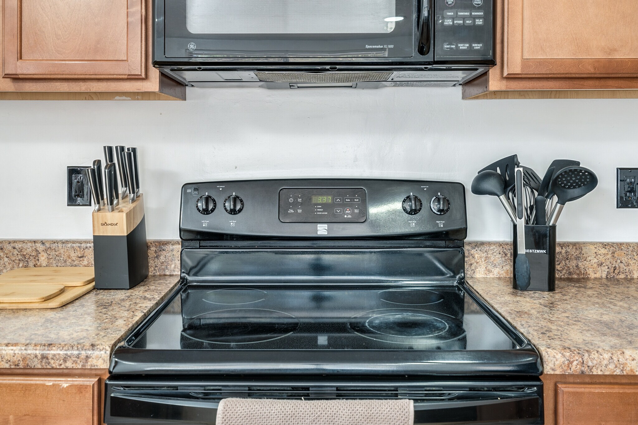 Glass top stove - 9870 E Celeste Dr