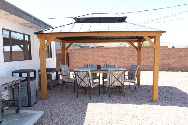 Building Photo - Long Term Rental! Available Unfurnished OR...