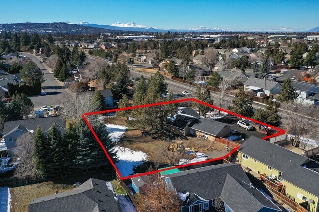 Building Photo - 1/2 acre in the with RV Hook ups