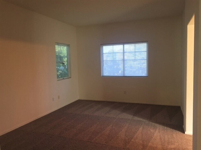 Building Photo - Three bedroom in gated community.