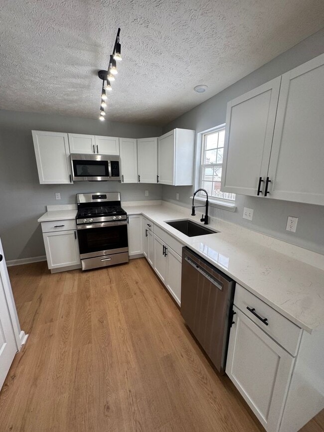 Building Photo - Newly Renovated 3BR/2BA Single-Family Home with Garage – Cleveland