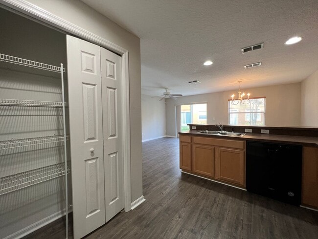 Building Photo - Bright 2BR 2.5BA Home w/ Community Pool/Playground Access • Full-Size Appliances • 1-Car Garage i...