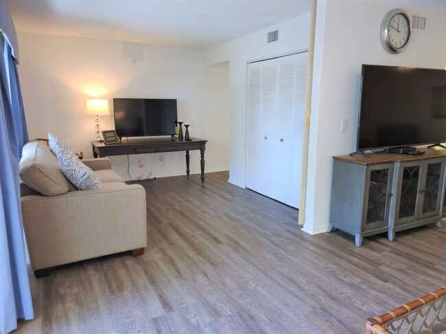 Building Photo - Bird Bay Village Annual Rental – Furnished 1st Floor Unit with Covered Parking
