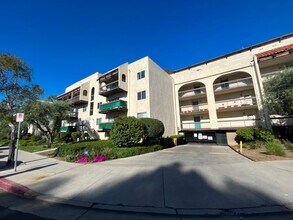 Building Photo - AVAILABLE NOW! 1BR w/patio, pool + spa, gym, parking + MORE!
