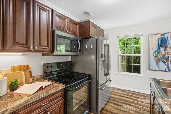 Building Photo - 6600/6602 Porterfield Road Unit
