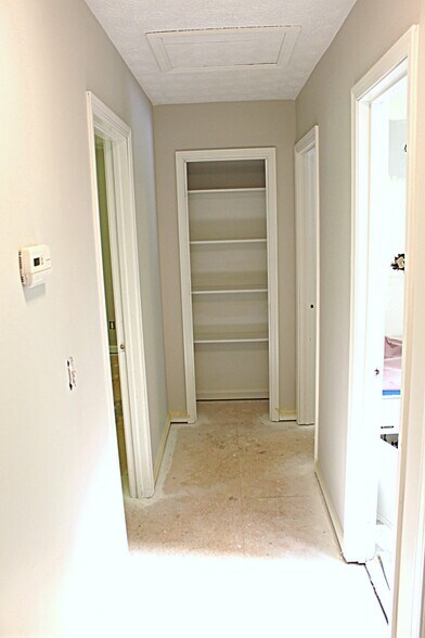 Linen Closet and entry to 3 upstairs bedrooms and bathrooms. - 1095 Mountain Springs Dr NW