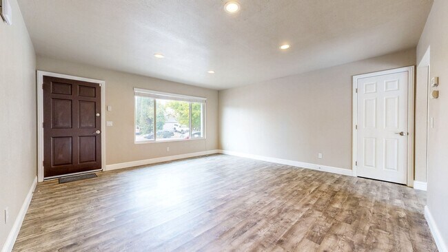 Building Photo - Bright 2 Bedroom, 1 Bathroom Single Family Home! Attached 2 Car Garage and Landscaping Included!
