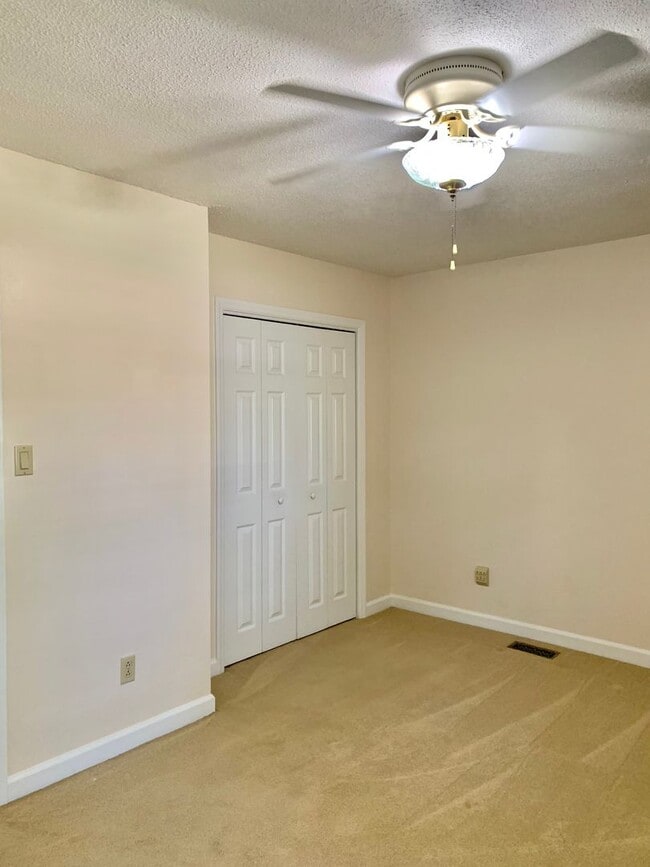 Building Photo - Charming Updated Home, Quiet Street Near Base, Fenced Yard!