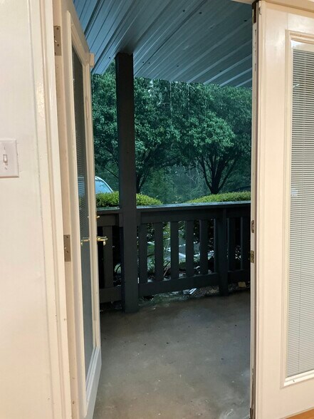 Scenic veiw patio on rainy day - 1010 Woodland Vlg