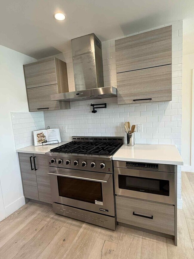 Building Photo - Modern 4-Bedroom Retreat in San Carlos – Remodeled, Spacious, Private Yard