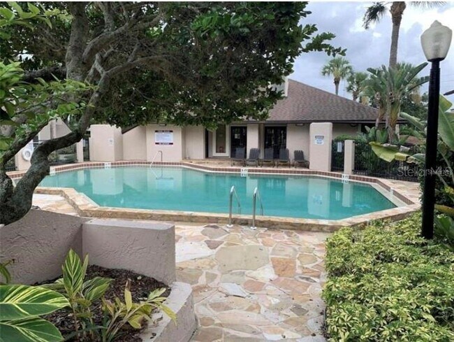 Building Photo - 1/1 Second Floor Remodeled Condo X Rent In...