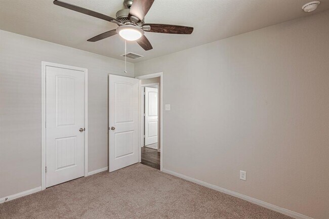 Building Photo - 4922 Blue Jacaranda Wy