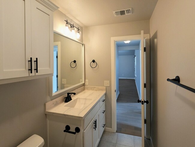 Building Photo - Spacious Yukon Home with Storm Shelter, 2-Car Garage & Fenced Yard!