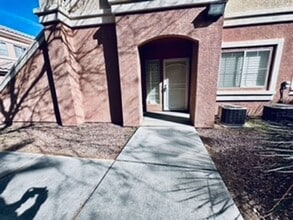 Building Photo - Cozy 1st-floor condo unit with 2 bedrooms and 2 bathrooms. Located in a guard-gated community in ...