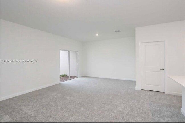 Building Photo - 26459 SW 148th Ave