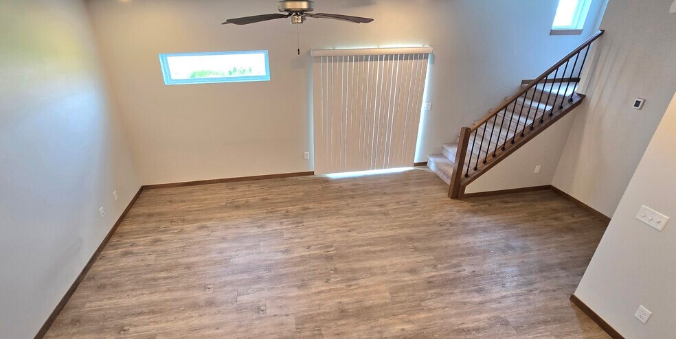 Main living area off kitchen - 6125 S Alki Pl