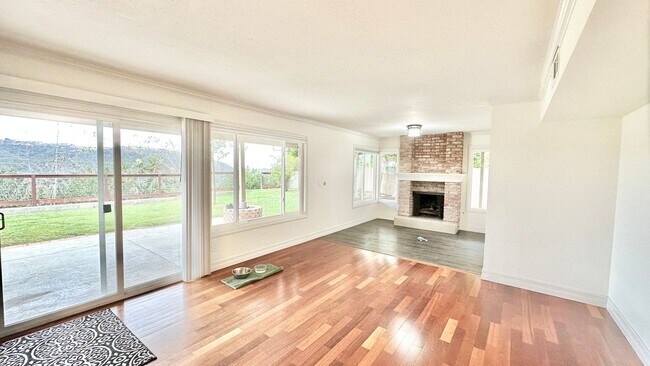 Building Photo - Spacious Two-Story Home with Three-Car Att...