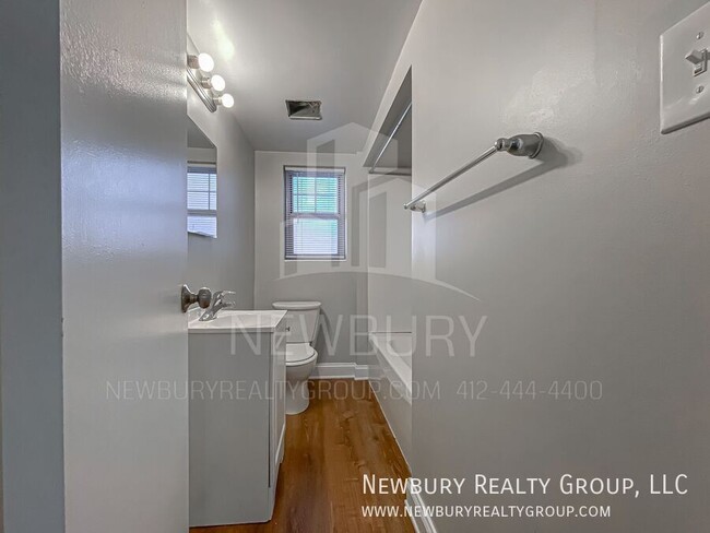 Building Photo - Modern One-Bedroom Apartment in Port Vue: ...