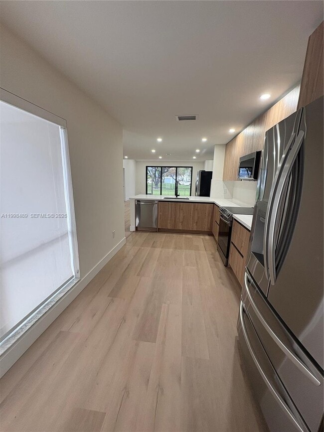 Building Photo - 9881 NW 52nd Terrace