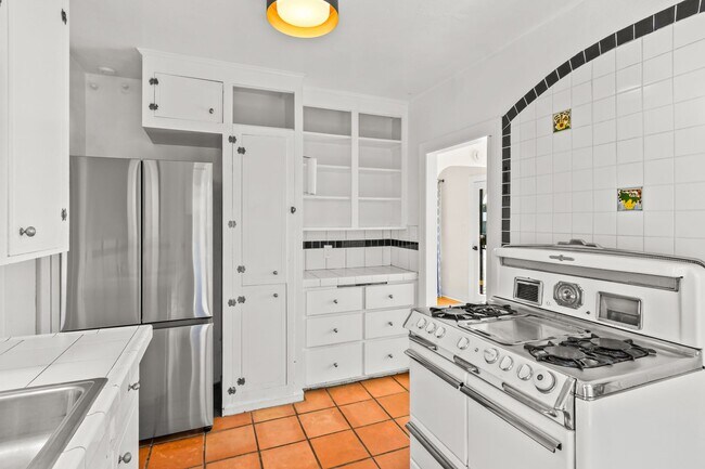 Building Photo - Move In Special!!  Elevated Golden Hill 2BR with Southwesterly Views with A/C & Detached Garage