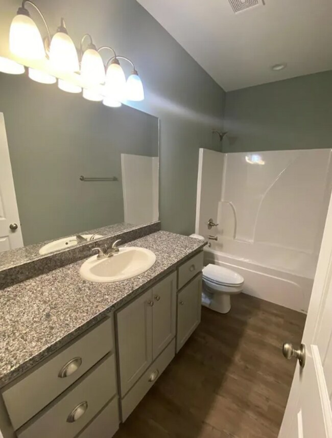 Building Photo - Spacious 4BR/2BA Home with Open Floor Plan, Granite Kitchen & Privacy Fence in Valdosta