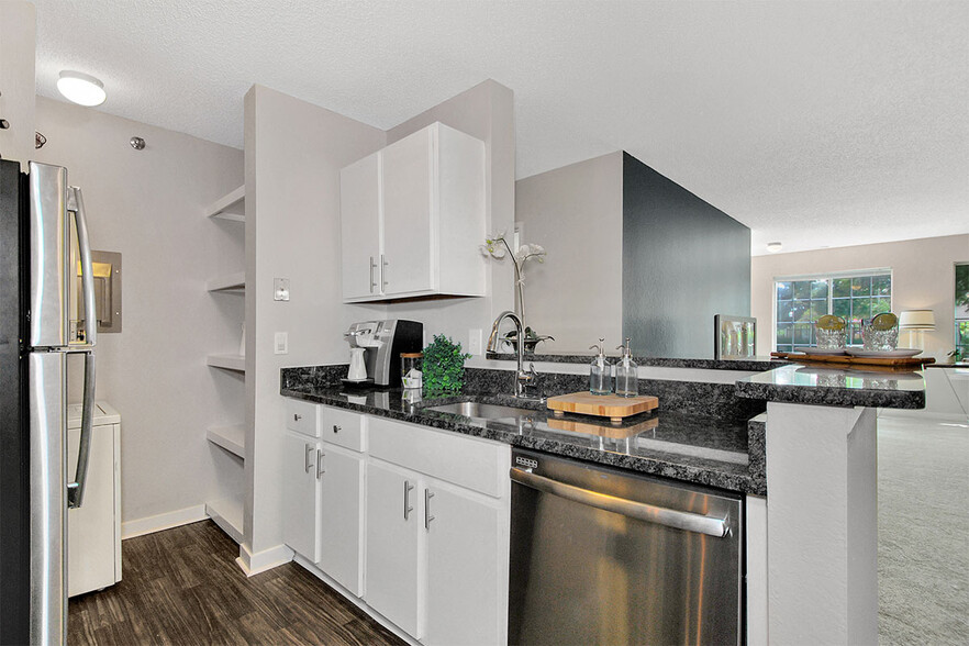 Renovated Kitchen with White Cabinetry - Cornerstone at Troy